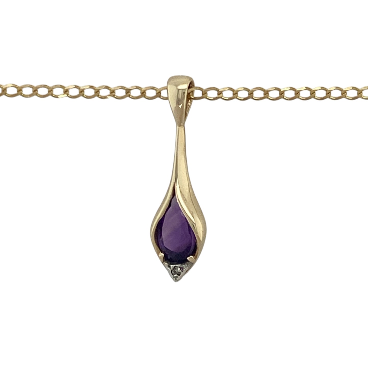 Bring elegant colour and classic sparkle to your collection with this pre-owned 9ct yellow gold diamond and amethyst set pendant necklace—perfect for adding a touch of sophistication to any look.

Design: The pendant features a beautiful 8mm by 6mm teardrop-shaped amethyst, radiating rich purple tones that symbolise calm and creativity. A sparkling diamond accent sits above the stone, enhancing its brilliance. The pendant measures 2.4cm long including the bail, creating a graceful drop design.