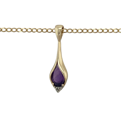 Bring elegant colour and classic sparkle to your collection with this pre-owned 9ct yellow gold diamond and amethyst set pendant necklace—perfect for adding a touch of sophistication to any look.

Design: The pendant features a beautiful 8mm by 6mm teardrop-shaped amethyst, radiating rich purple tones that symbolise calm and creativity. A sparkling diamond accent sits above the stone, enhancing its brilliance. The pendant measures 2.4cm long including the bail, creating a graceful drop design.