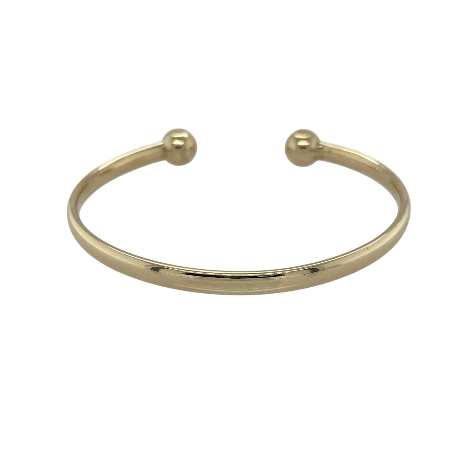 Add classic elegance and refined simplicity to your collection with this pre-owned 9ct solid yellow gold torque bangle — a timeless design that exudes sophistication and versatility.

Design: The open torque style features a sleek, rounded band finished with two polished 8mm ball ends, creating a balanced and contemporary look that’s perfect for everyday wear or special occasions.