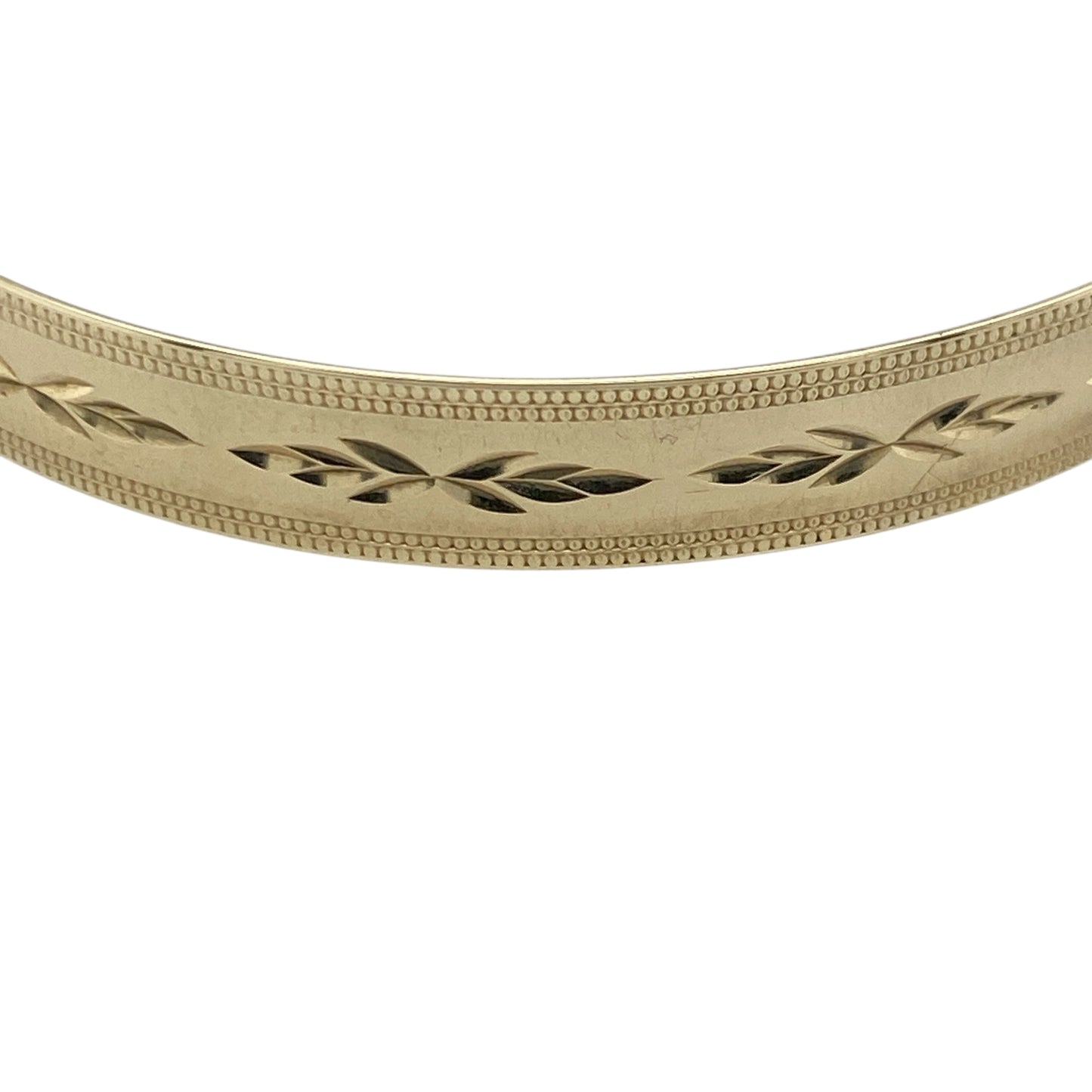 Add timeless charm and versatility to your collection with this pre-owned 9ct yellow solid gold patterned expanding bangle — a beautiful piece that combines classic design with practical elegance.

Design: The bangle features an intricate patterned finish across its surface, adding texture and visual appeal, while the expanding mechanism ensures a comfortable and flexible fit for the wearer.
Material: Made from solid 9-carat yellow gold, the warm tone enhances the detailed design and gives the piece a rich
