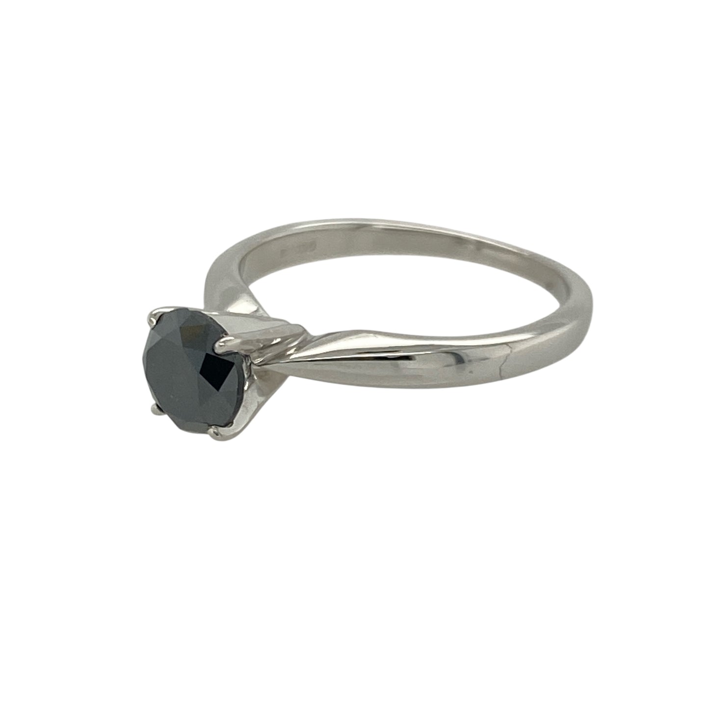 Add bold sophistication and contemporary elegance to your collection with this pre-owned 18ct white gold black diamond set solitaire ring — a striking piece that combines modern style with timeless allure.

Design: The ring features a brilliant-cut black diamond of approximately 0.76 carats, creating a captivating centrepiece with a rich, mysterious sparkle and sleek minimalist setting.