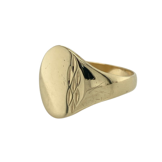 Add timeless elegance and traditional style to your collection with this pre-owned 9ct yellow gold patterned oval signet ring — a refined piece that blends classic design with intricate detail.

Design: The ring features an oval-shaped front measuring 14mm high, enhanced with a finely patterned surface that adds depth and character to its polished appearance.
Material: Made from 9-carat yellow gold, the rich golden tone highlights the detailing and provides a warm, luxurious finish.