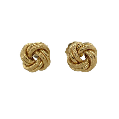 Add classic style and subtle sophistication to your collection with these pre-owned 9ct yellow gold textured knot stud earrings — a timeless design that symbolises unity and elegance.

Design: Each earring features an 8mm knot design with a textured finish, creating beautiful depth and light reflection for a refined yet eye-catching look.
Material: Made from 9-carat yellow gold, the warm golden tone enhances the textured detailing and offers a polished, luxurious appearance.