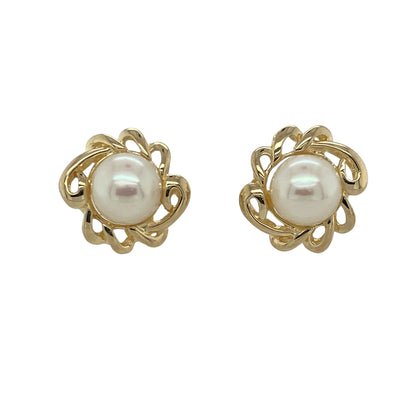 Add timeless elegance and refined charm to your collection with these pre-owned 9ct yellow gold and pearl set knot stud earrings — a sophisticated design that perfectly blends classic style with luxurious detail.

Design: Each earring features an 8mm pearl gracefully nestled within an intricate gold knot, symbolising unity and everlasting beauty. The design offers a harmonious balance of lustrous pearls and polished gold.