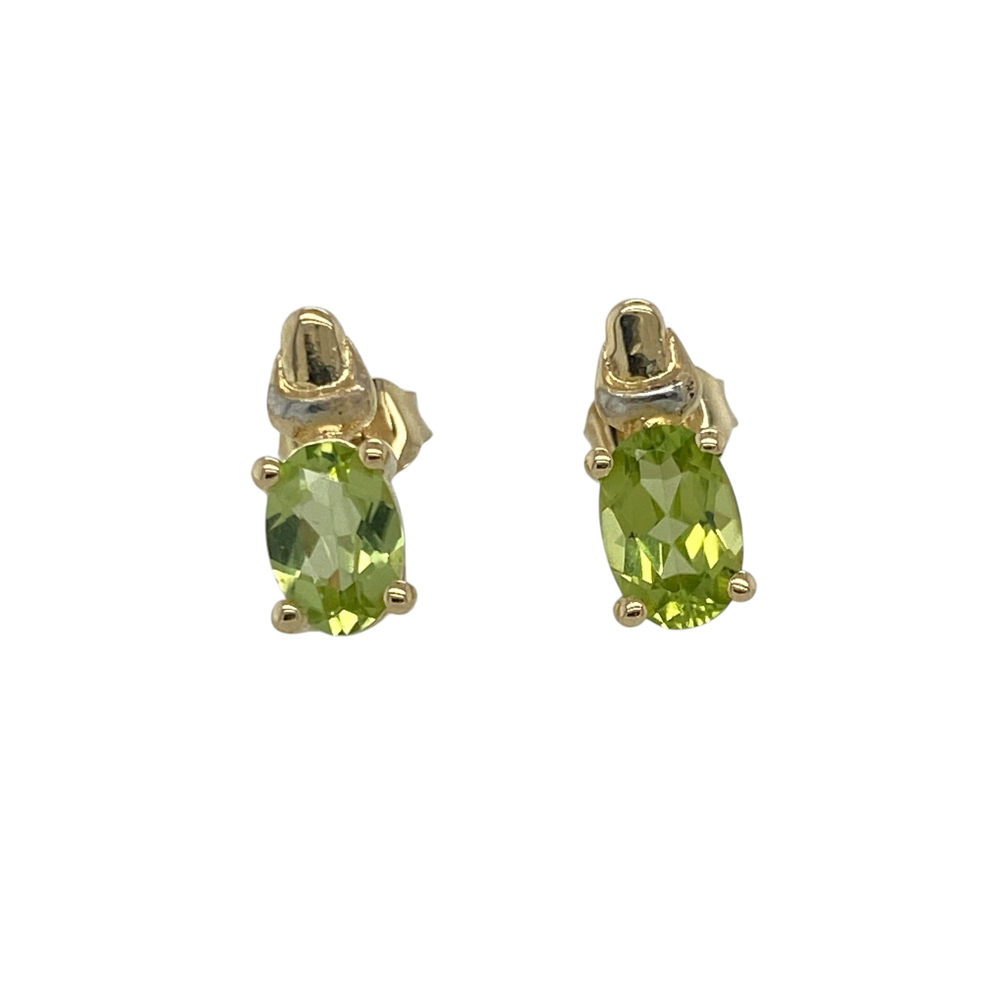 Add a fresh touch of colour and elegant simplicity to your collection with these pre-owned 9ct yellow and white gold oval peridot stud earrings — a vibrant design that radiates timeless charm.

Design: Each earring features an oval-cut peridot measuring 6mm by 4mm, showcasing a lively green hue that brings a refreshing sparkle and natural beauty to the design.
