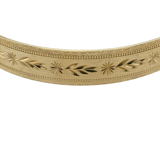 Pre-owned 9ct Solid Yellow Gold Patterned Expanding Bangle with the weight 15.20 grams and bangle width 9mm.