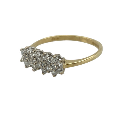 Bring floral elegance and radiant sparkle to your collection with this pre-owned 18ct yellow gold diamond set flower cluster band ring, offering timeless charm and refined brilliance—perfect for both everyday wear and special occasions.

Design: The ring features a beautiful flower cluster design adorned with diamonds totalling approximately 0.31ct, creating a delicate yet eye-catching arrangement.