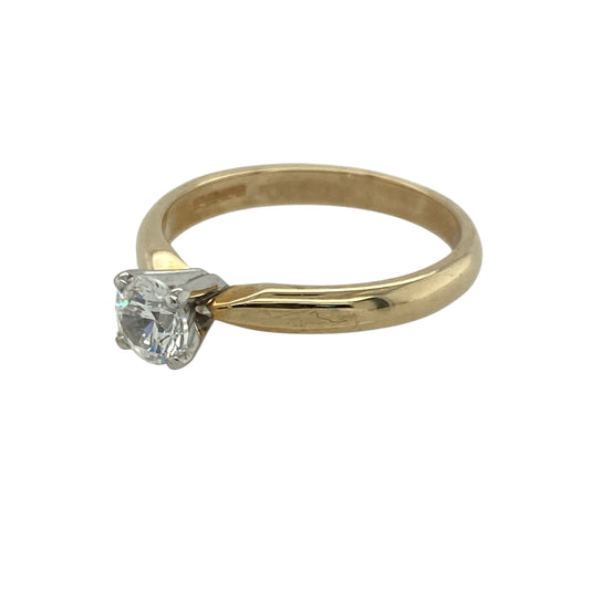 New 9ct Yellow Gold &amp; Swarovski Crystal Set brilliant cut Solitaire Ring in size N with the weight 2.60 grams. The stone is a 0.50ct size