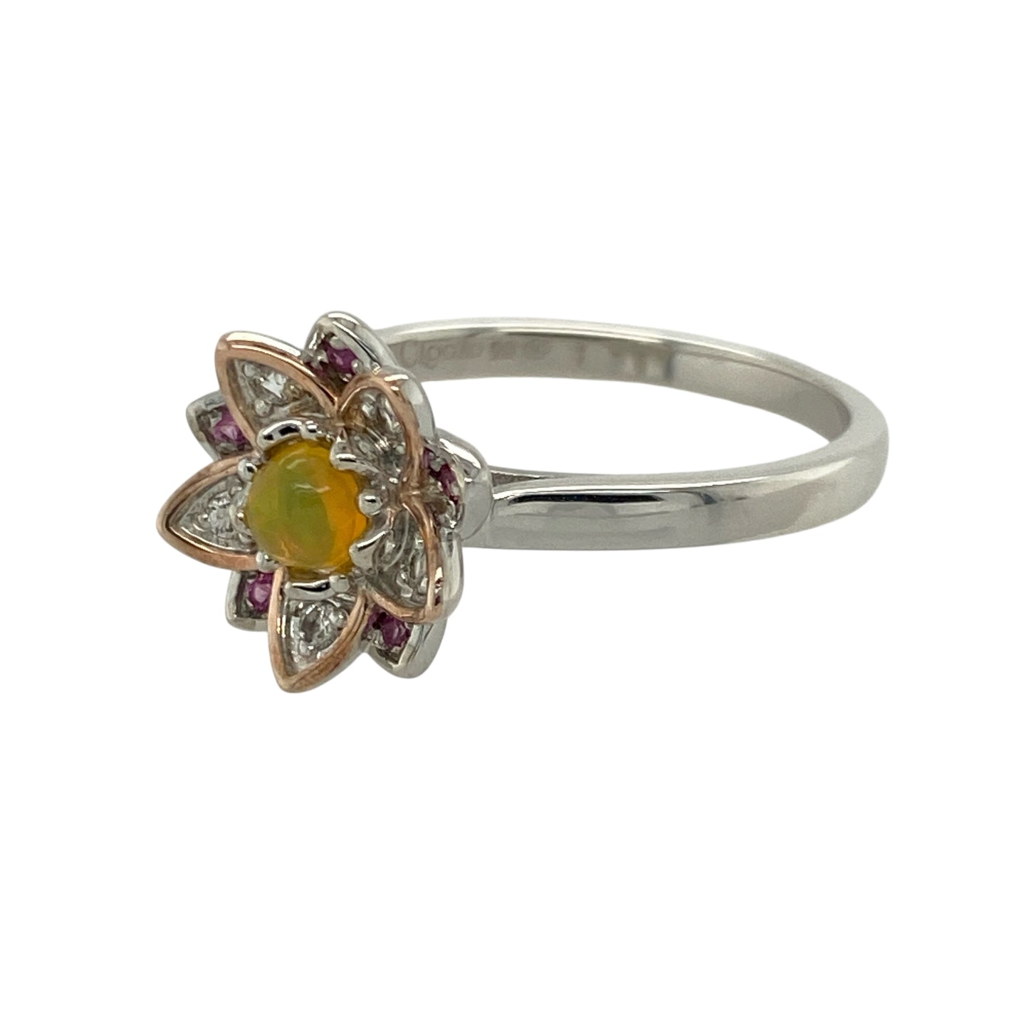Embrace harmony and radiant colour with this pre-owned 925 silver and 9ct rose gold Clogau Lotus Flower ring, symbolising purity and enlightenment—perfect for adding a touch of beauty and meaning to your jewellery collection.

Design: The ring features an intricate lotus flower motif measuring 12mm high, with a warm yellow topaz at the centre surrounded by delicate white and pink topaz stones set within the petals, creating a soft, graceful palette of colour and sparkle.