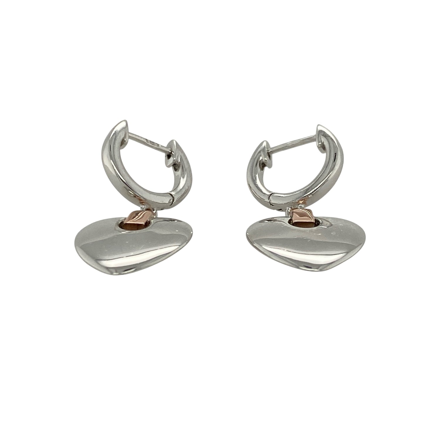 Add romantic charm and timeless elegance to your collection with these pre-owned 925 silver and 9ct rose gold Clogau heart drop earrings, blending classic design with meaningful detail—perfect for both everyday wear and special occasions.

Design: Each earring features a graceful heart motif suspended from a polished drop setting, creating beautiful movement and a feminine silhouette.
