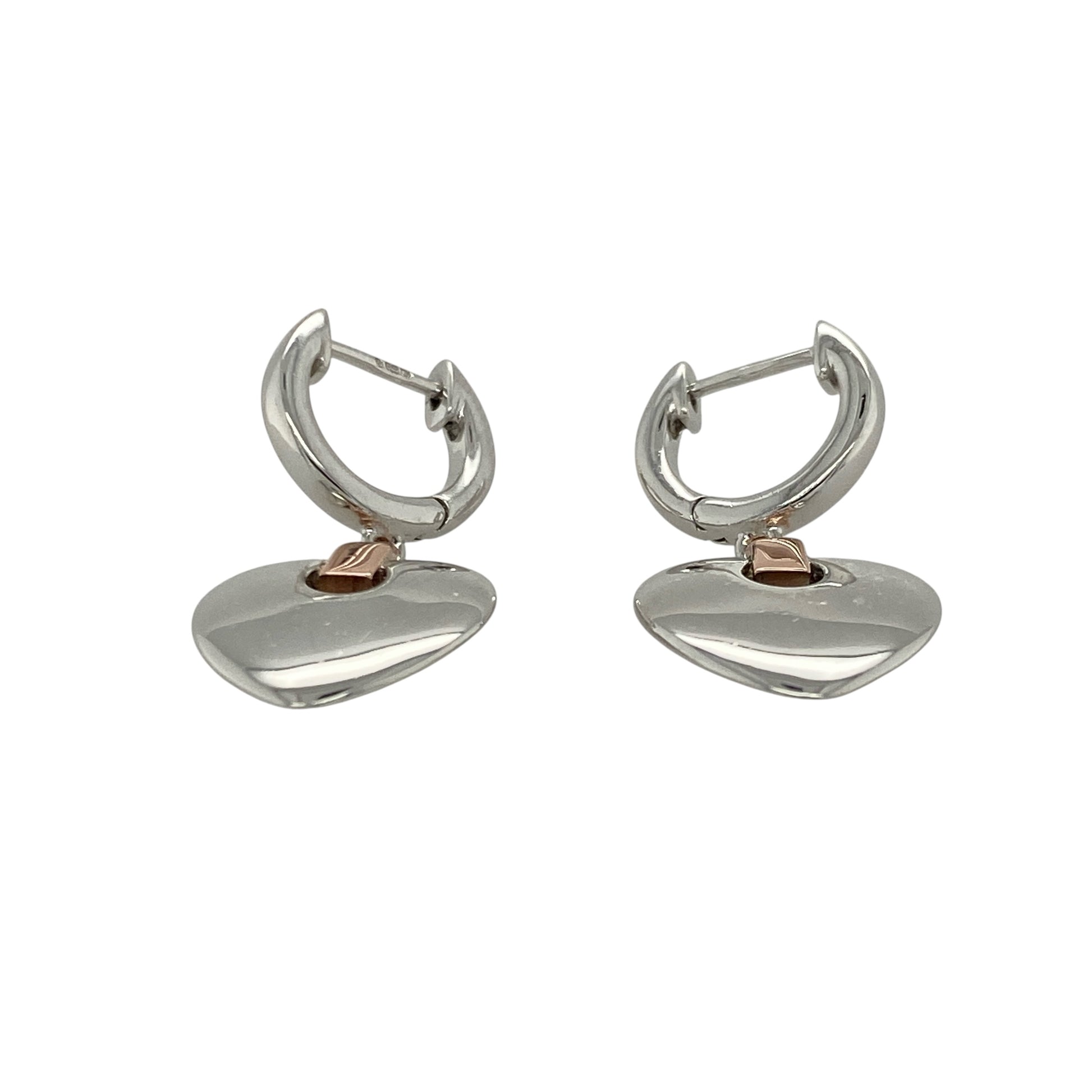 Add romantic charm and timeless elegance to your collection with these pre-owned 925 silver and 9ct rose gold Clogau heart drop earrings, blending classic design with meaningful detail—perfect for both everyday wear and special occasions.

Design: Each earring features a graceful heart motif suspended from a polished drop setting, creating beautiful movement and a feminine silhouette.