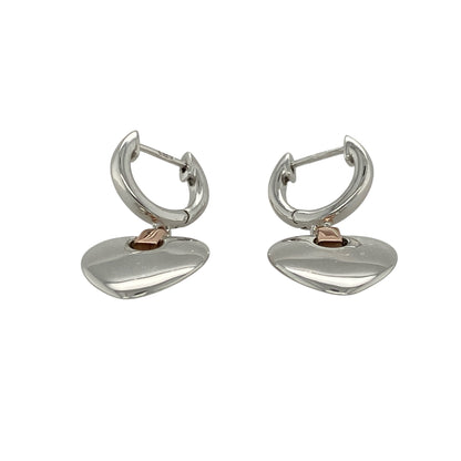 Add romantic charm and timeless elegance to your collection with these pre-owned 925 silver and 9ct rose gold Clogau heart drop earrings, blending classic design with meaningful detail—perfect for both everyday wear and special occasions.

Design: Each earring features a graceful heart motif suspended from a polished drop setting, creating beautiful movement and a feminine silhouette.