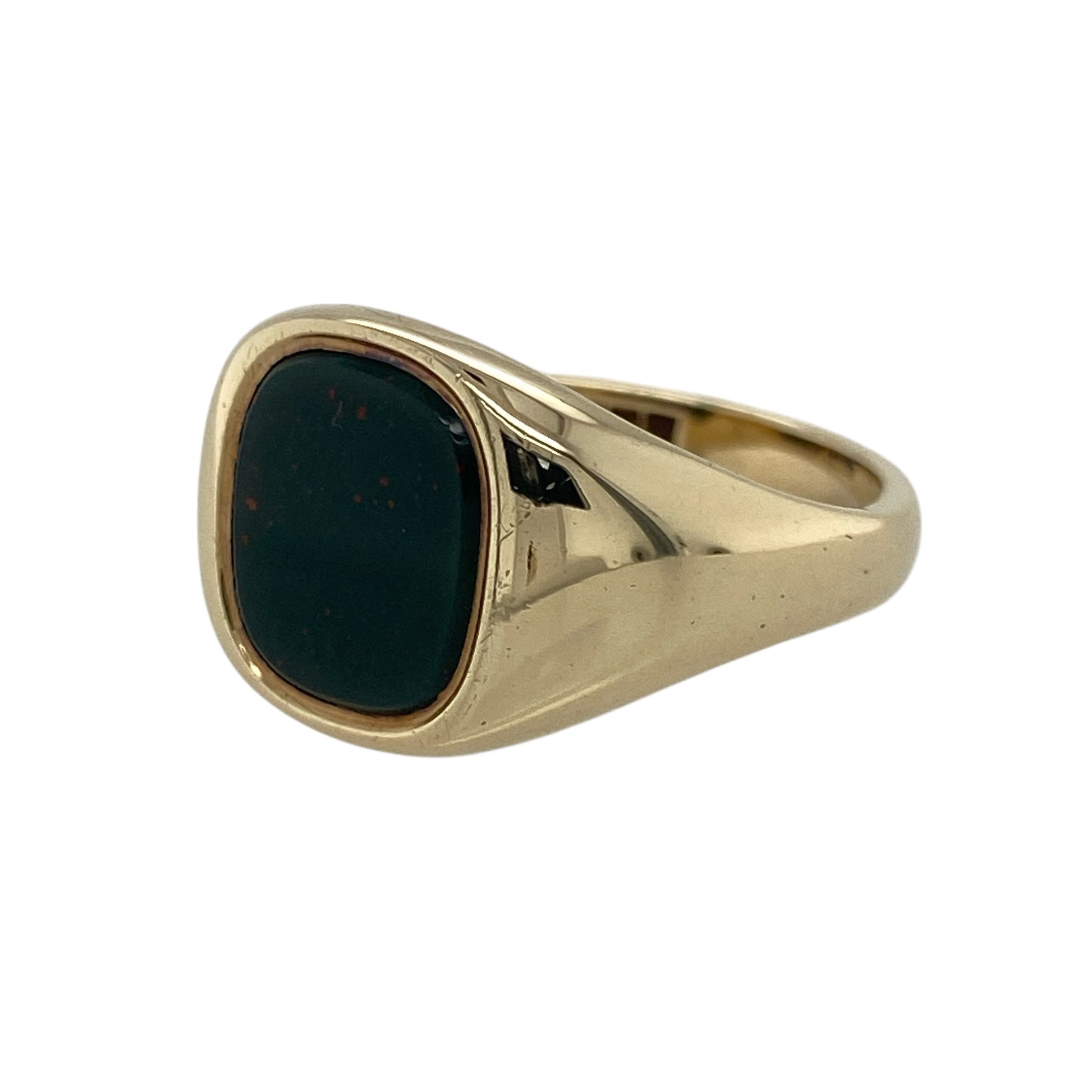 Add rich colour and traditional style to your collection with this pre-owned 9ct yellow gold and bloodstone signet ring, combining timeless craftsmanship with bold, masculine appeal—perfect for everyday wear or special occasions.

Design: The ring features a rounded rectangular bloodstone measuring 10mm by 9mm, showcasing deep green tones with characteristic flecks of red for a distinctive and classic look.