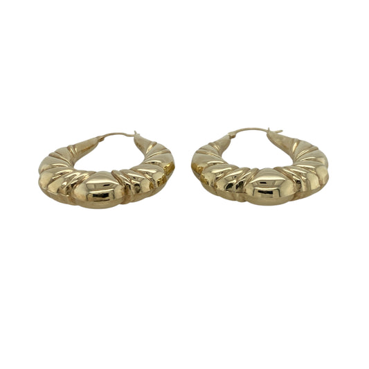Add bold style and timeless shine to your collection with these pre-owned 9ct yellow gold bubble-style large oval creole earrings, offering a statement look with a touch of vintage charm—perfect for everyday wear or special occasions.

Design: Each earring features a large oval creole shape with a distinctive bubble-style texture, creating depth and movement that beautifully catches the light.
Material: Made from 9-carat yellow gold, the polished finish enhances the earrings’ warm tone and radiant appeal.