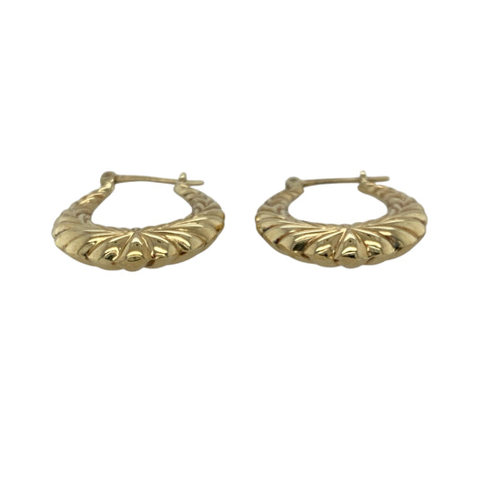 Add classic elegance and subtle texture to your collection with these pre-owned 9ct yellow gold patterned creole earrings, offering timeless style with a touch of intricate detail—perfect for everyday wear or special occasions.

Design: Each earring features a traditional creole hoop shape adorned with delicate patterned detailing that catches the light beautifully.
Material: Made from 9-carat yellow gold, the polished finish enhances the warm tone of the metal and adds refined shine.