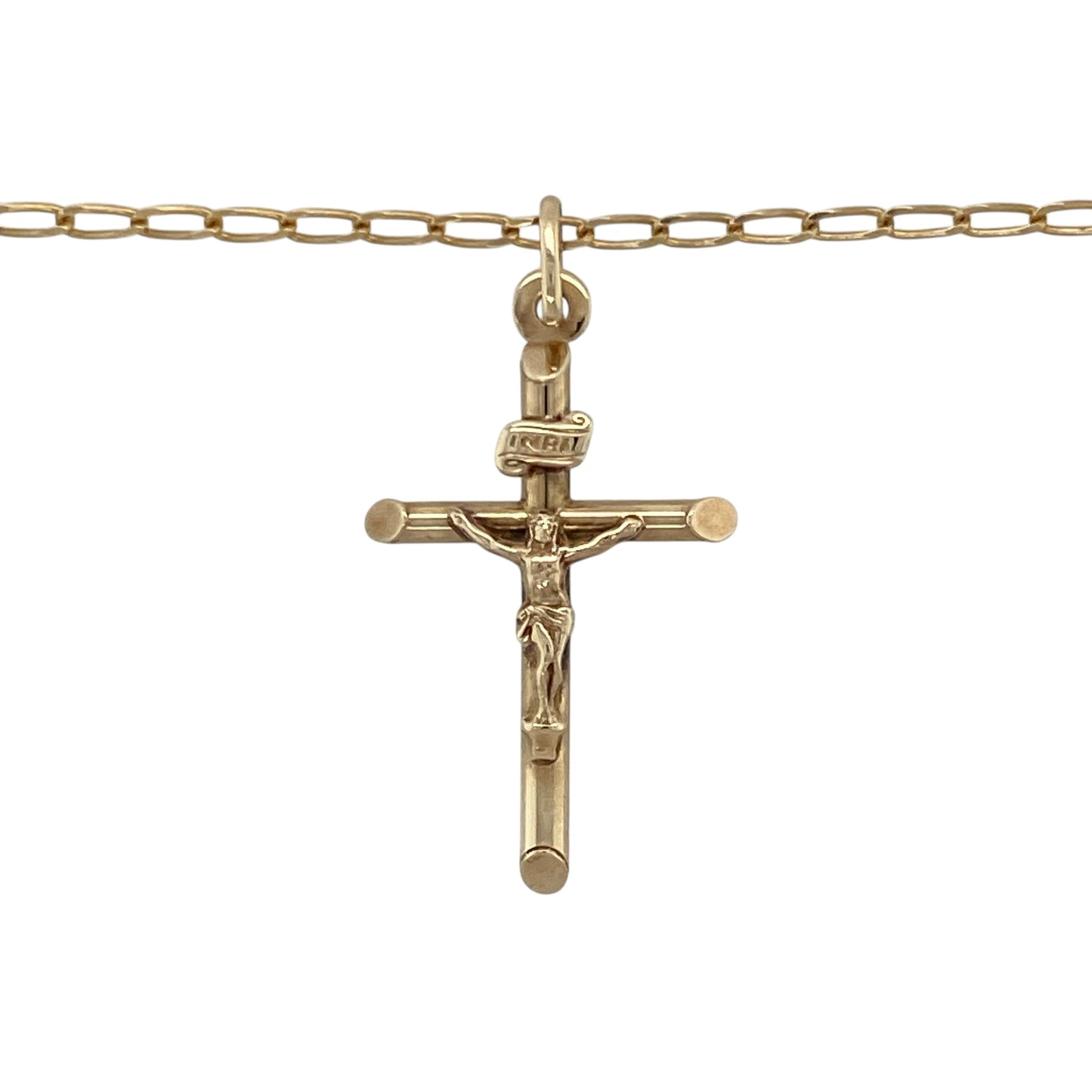 Add timeless faith and refined elegance to your collection with this pre-owned 9ct yellow gold crucifix pendant necklace, a meaningful symbol of devotion and classic style—perfect for everyday wear or gifting.

Design: The pendant features a traditional crucifix design measuring 3.3cm long including the bail, with fine detailing that enhances its spiritual and aesthetic appeal.
Material: Made from 9-carat yellow gold, the polished finish provides a warm, radiant glow and enduring shine.