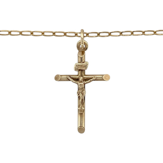 Add timeless faith and refined elegance to your collection with this pre-owned 9ct yellow gold crucifix pendant necklace, a meaningful symbol of devotion and classic style—perfect for everyday wear or gifting.

Design: The pendant features a traditional crucifix design measuring 3.3cm long including the bail, with fine detailing that enhances its spiritual and aesthetic appeal.
Material: Made from 9-carat yellow gold, the polished finish provides a warm, radiant glow and enduring shine.