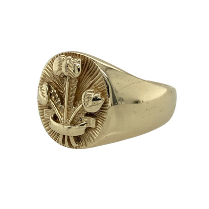 Bring heritage and bold design to your collection with this pre-owned 9ct yellow gold Welsh Three Feathers oval signet ring—a striking piece celebrating pride and tradition.

Design: The ring features the iconic Welsh Three Feathers emblem engraved on an oval-shaped front, symbolising courage and honour with classic detail and depth.
Material: Made from 9-carat yellow gold, the polished finish highlights the intricate design and gives the ring a rich, lustrous appearance.