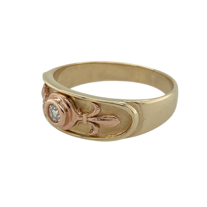 Bring elegance and heritage-inspired style to your collection with this pre-owned 9ct yellow and rose gold diamond set Clogau Fleur De Lis band ring—a refined piece that blends tradition with modern sophistication.

Design: The ring showcases the classic Fleur De Lis motif accented with sparkling diamonds across the front, symbolising purity, strength, and grace.
