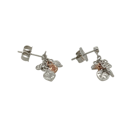 Bring natural elegance and fresh colour to your collection with these pre-owned 925 silver with 9ct rose gold and peridot set Clogau leaf drop earrings—a graceful design inspired by nature and renewal.

Design: Each earring features a delicate leaf motif accented with a vibrant peridot gemstone, symbolising growth, harmony, and vitality.