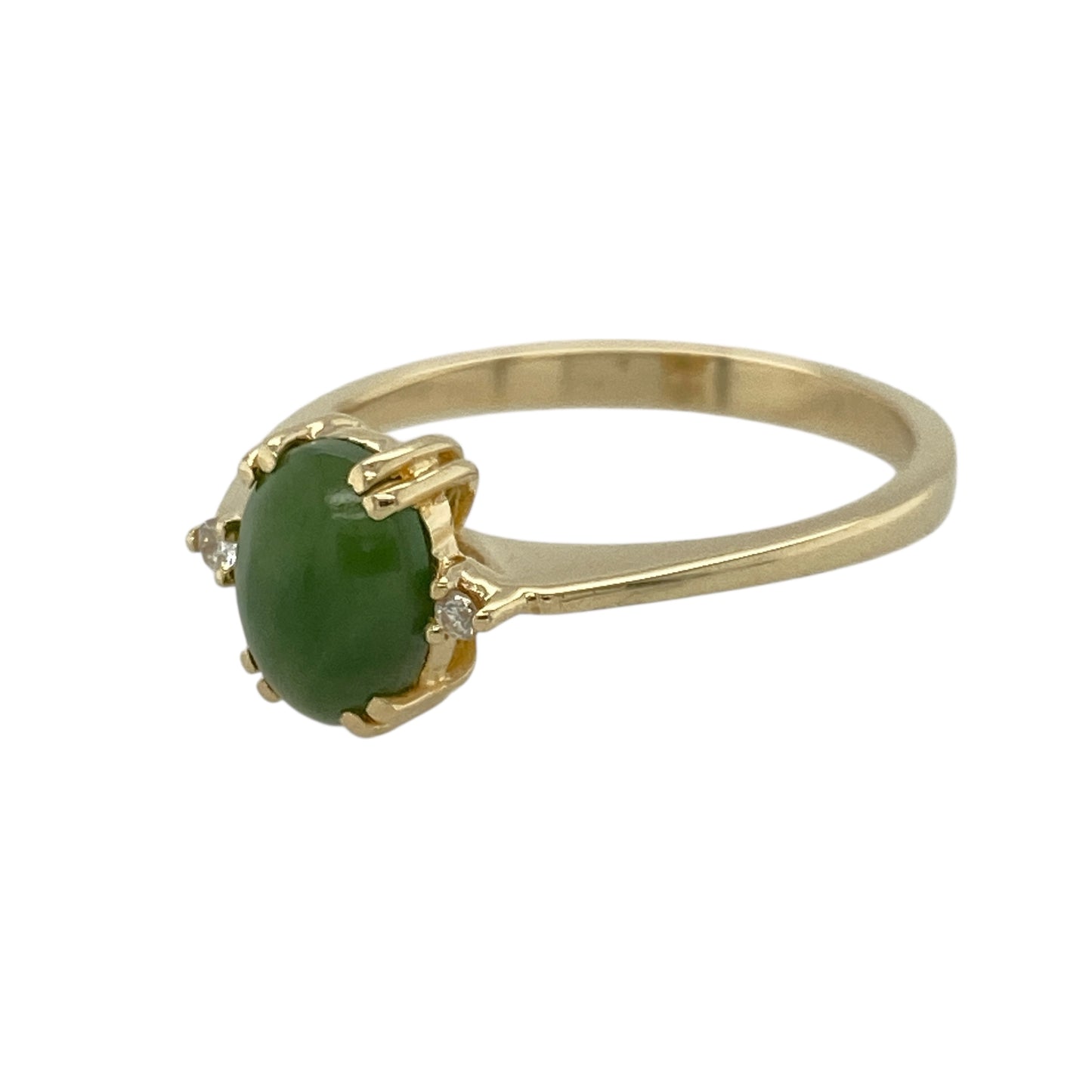 Bring natural beauty and elegant simplicity to your collection with this pre-owned 14ct yellow gold diamond and jade set ring—a refined piece that blends timeless style with serene colour.

Design: The ring features an 8mm by 6mm oval jade stone at the centre, flanked by a small diamond on either side, creating a graceful balance of soft green hues and subtle sparkle.
Material: Made from 14-carat yellow gold, the warm tone enhances the richness of the jade and complements the brilliance of the diamonds.