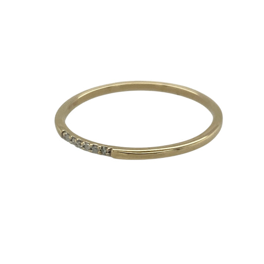 Bring subtle sparkle and understated elegance to your collection with this pre-owned 9ct yellow gold diamond set band ring—a delicate piece that adds a refined touch to any look.

Design: The ring features six small diamonds set across the front of the slim 1mm wide band, offering a subtle shimmer that catches the light beautifully.
Material: Made from 9-carat yellow gold, the polished finish enhances the sparkle of the diamonds and provides a warm, timeless glow. 