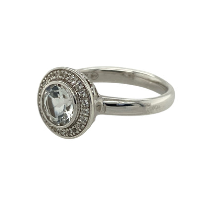 Bring radiant sparkle and symbolic beauty to your collection with this pre-owned 925 silver with 9ct rose gold and white topaz set Clogau Tree of Life halo ring—a stunning piece celebrating growth, harmony, and everlasting love.

Design: The ring features a 6mm round white topaz centre stone surrounded by a sparkling halo, complemented by Clogau’s signature Tree of Life detailing in warm rose gold for added depth and elegance.