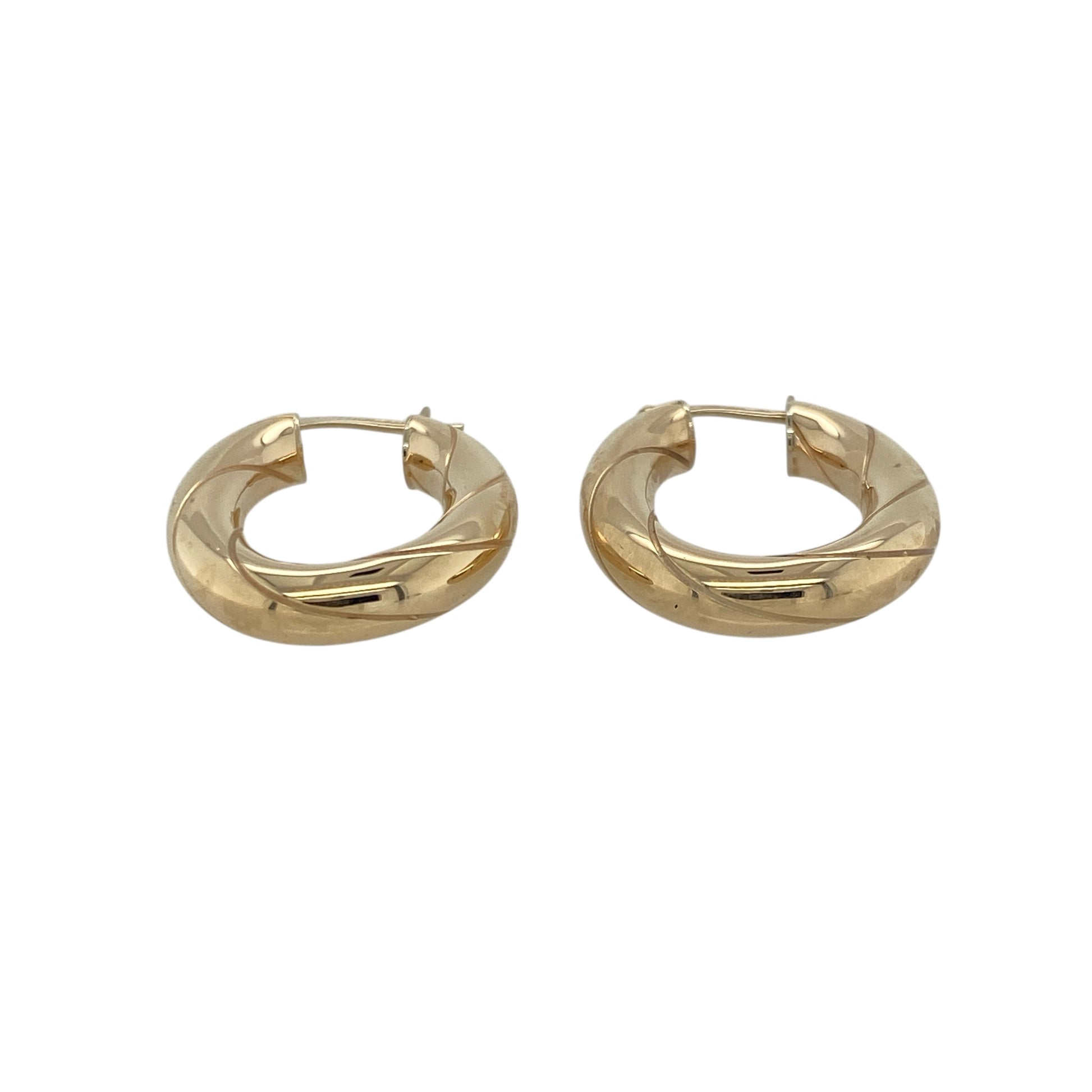 Add classic elegance and refined shine to your collection with these pre-owned 9ct yellow gold oval twist creole earrings, offering timeless style with a touch of modern flair—perfect for everyday wear or special occasions.

Design: Each earring features an oval creole shape with a graceful twisted design, creating soft movement and beautiful light reflection from every angle.
Material: Made from 9-carat yellow gold, the polished finish enhances the rich golden tone and adds lasting brilliance.