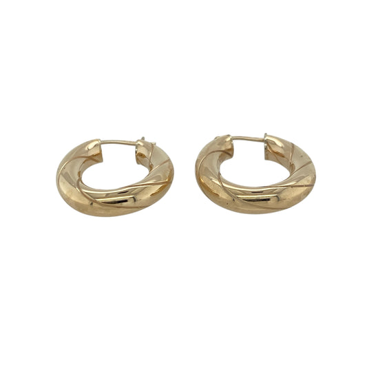 Add classic elegance and refined shine to your collection with these pre-owned 9ct yellow gold oval twist creole earrings, offering timeless style with a touch of modern flair—perfect for everyday wear or special occasions.

Design: Each earring features an oval creole shape with a graceful twisted design, creating soft movement and beautiful light reflection from every angle.
Material: Made from 9-carat yellow gold, the polished finish enhances the rich golden tone and adds lasting brilliance.