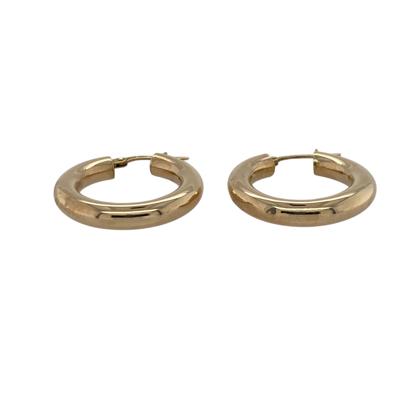 Add timeless simplicity and everyday elegance to your collection with these pre-owned 9ct yellow gold plain hoop creole earrings, a classic accessory that never goes out of style—perfect for any occasion.

Design: Each earring features a smooth and polished creole hoop design, offering a clean, minimalist look that catches the light beautifully.
Material: Made from 9-carat yellow gold, the high-shine finish enhances the warm golden tone for a refined and versatile appearance.