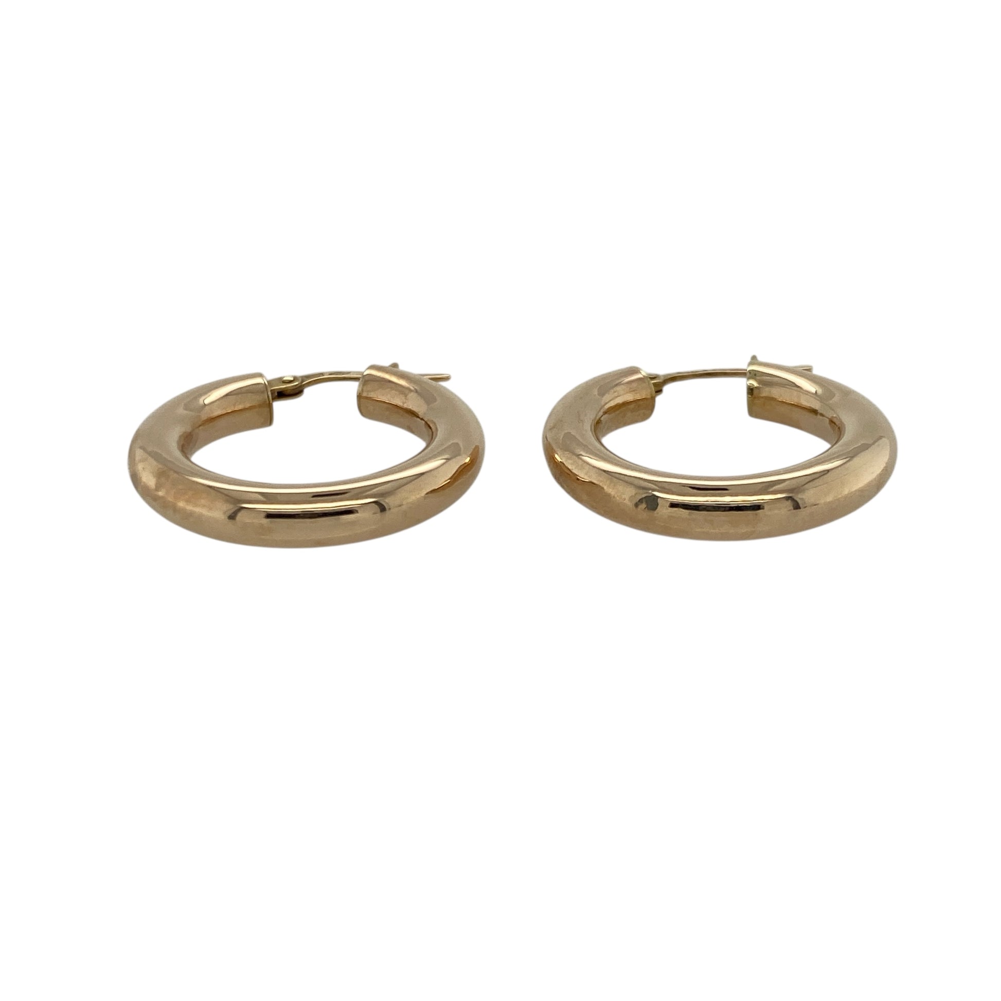 Add timeless simplicity and everyday elegance to your collection with these pre-owned 9ct yellow gold plain hoop creole earrings, a classic accessory that never goes out of style—perfect for any occasion.

Design: Each earring features a smooth and polished creole hoop design, offering a clean, minimalist look that catches the light beautifully.
Material: Made from 9-carat yellow gold, the high-shine finish enhances the warm golden tone for a refined and versatile appearance.
