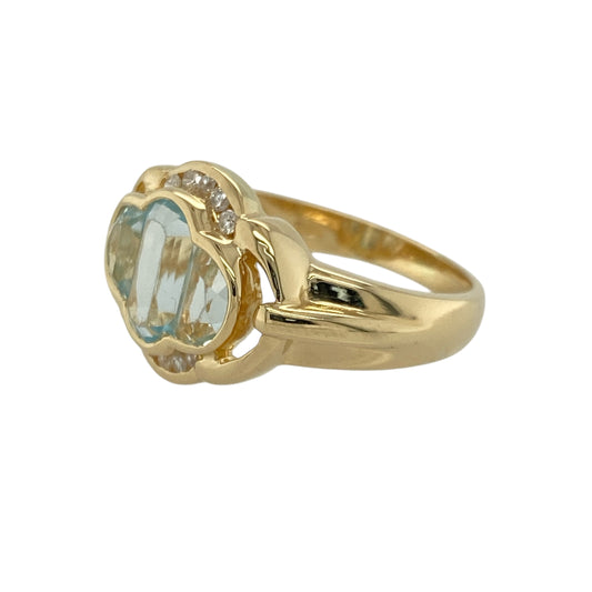 Add refined elegance and serene colour to your collection with this pre-owned 18ct yellow gold aquamarine and diamond dress ring, blending classic sophistication with luxurious sparkle—perfect for special occasions or timeless everyday style.

Design: The ring features a beautifully faceted aquamarine at its centre, radiating a soft blue hue complemented by sparkling diamond accents that enhance its brilliance and charm.
