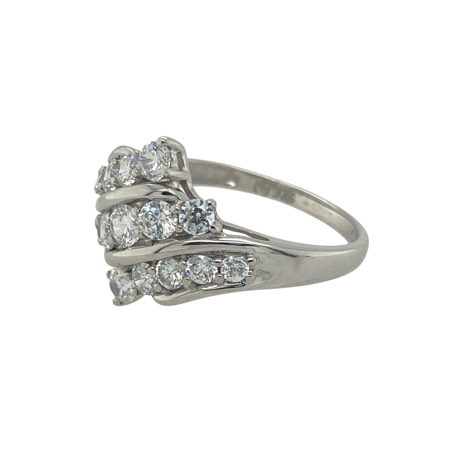 Add refined sparkle and contemporary elegance to your collection with this pre-owned 9ct white gold cubic zirconia three-row diagonal ring, offering a modern twist on classic brilliance—perfect for everyday wear or evening sophistication.

Design: The ring features three diagonal rows of five cubic zirconia stones each, creating a striking pattern that catches the light beautifully from every angle.
