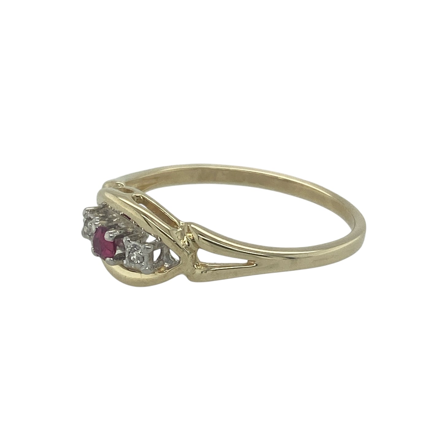 Add a touch of colour and sparkle to your collection with this pre-owned 9ct yellow gold diamond and ruby trilogy open weave ring—elegant, delicate, and full of timeless charm.

Design: The ring features a central ruby measuring approximately 2mm by 2mm, flanked by two shimmering diamonds in a graceful trilogy layout, symbolising past, present, and future.
