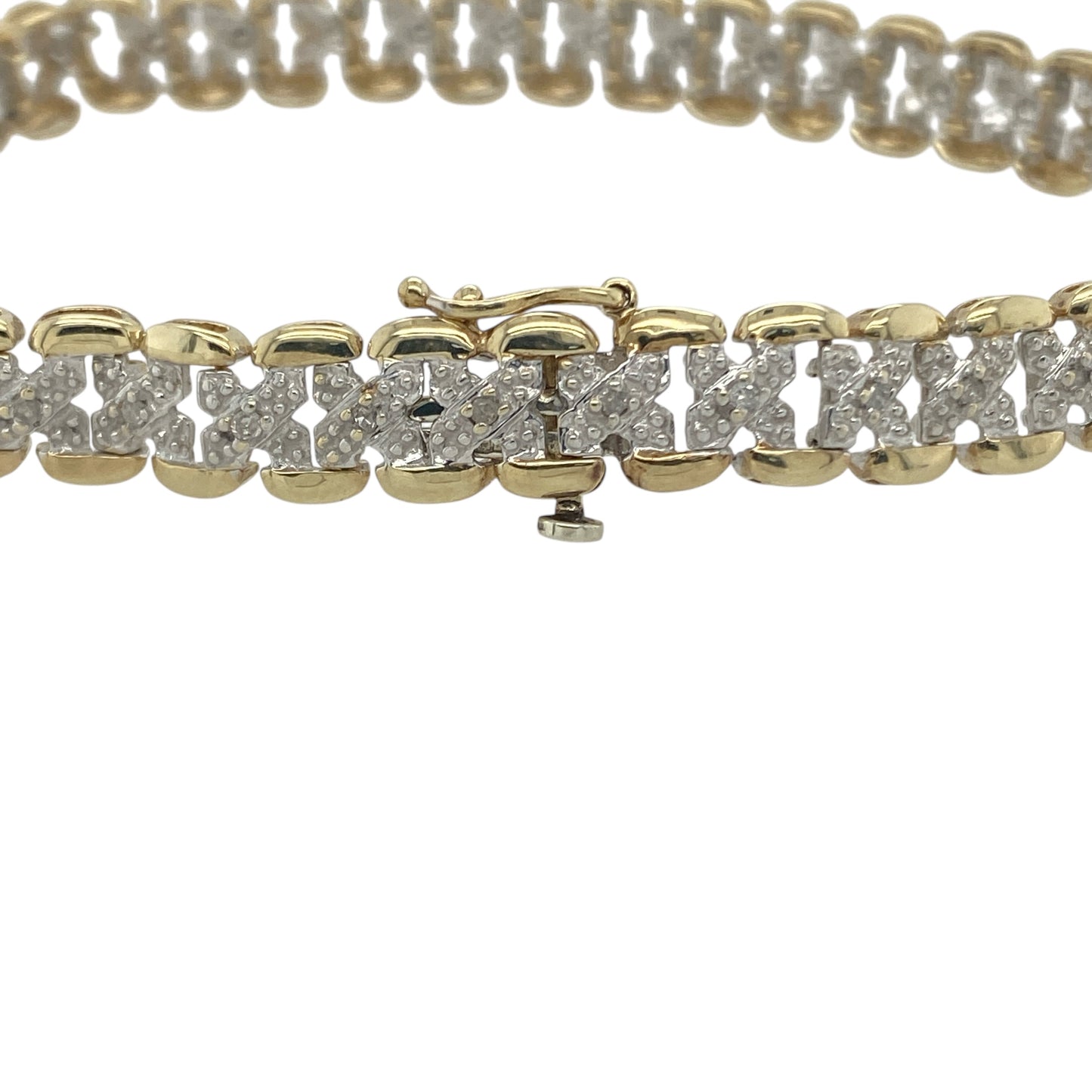 Add a touch of timeless sparkle to your collection with this pre-owned 9ct yellow gold diamond set bracelet—elegant, refined, and perfect for any occasion.

Design: The bracelet features a series of polished gold links accented with sparkling diamonds, creating a classic and sophisticated look that catches the light beautifully.
Material: Made from 9-carat yellow gold, the polished finish enhances the warm golden tone and complements the brilliance of the diamonds.

