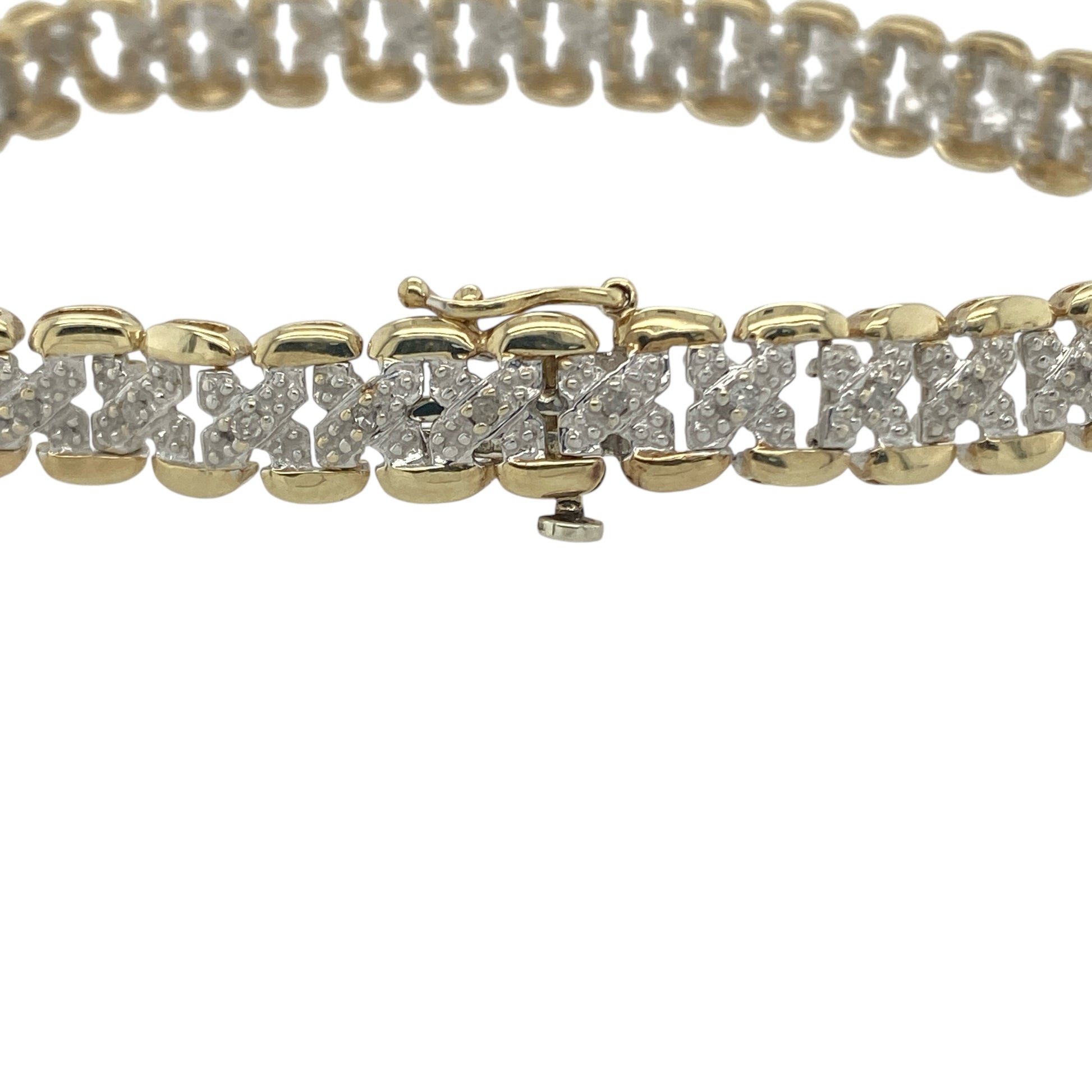 Add a touch of timeless sparkle to your collection with this pre-owned 9ct yellow gold diamond set bracelet—elegant, refined, and perfect for any occasion.

Design: The bracelet features a series of polished gold links accented with sparkling diamonds, creating a classic and sophisticated look that catches the light beautifully.
Material: Made from 9-carat yellow gold, the polished finish enhances the warm golden tone and complements the brilliance of the diamonds.
