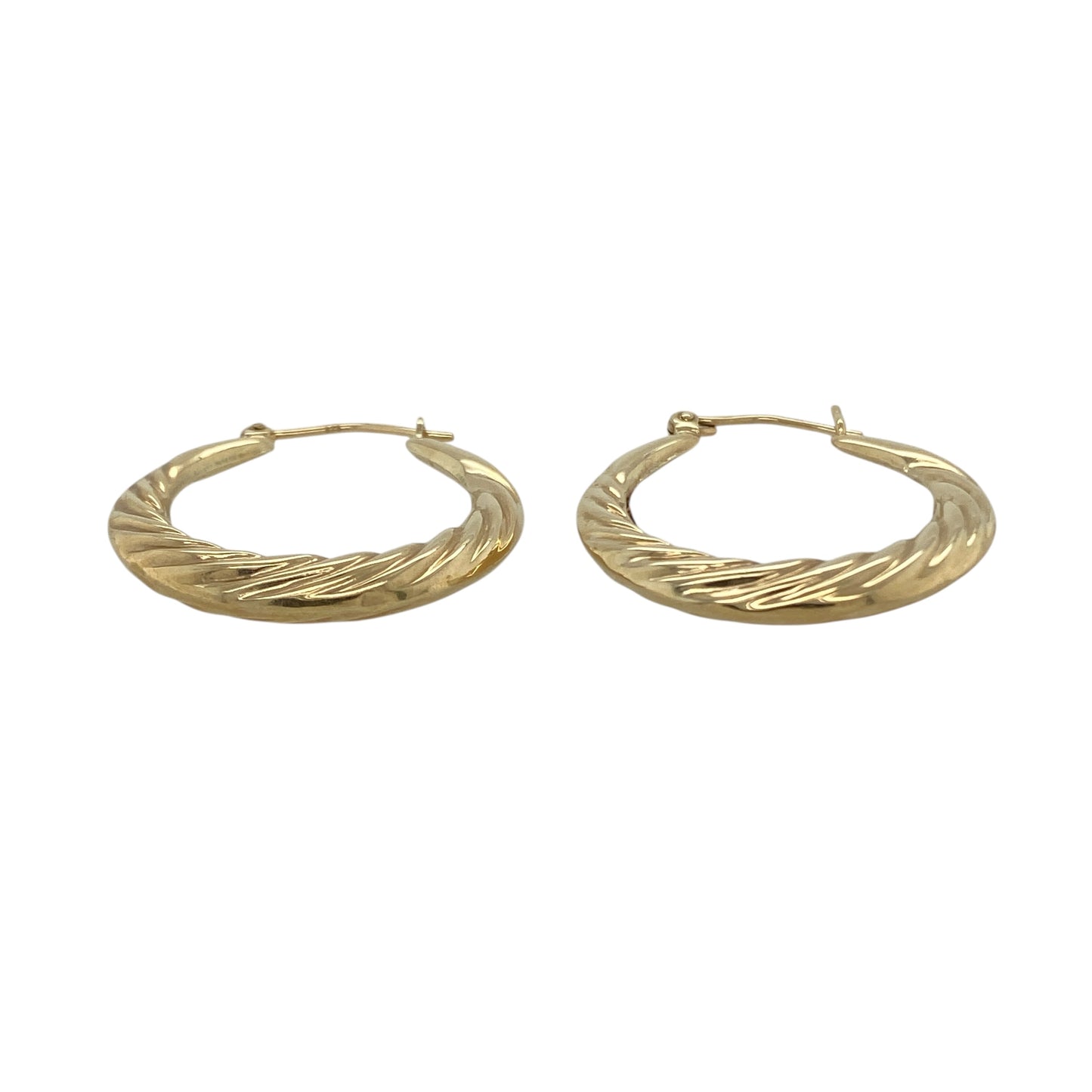 Bring elegant texture and classic shine to your collection with these pre-owned 9ct yellow gold twisted patterned hoop creole earrings—an eye-catching pair with timeless appeal.

Design: Featuring a traditional creole hoop enhanced with a twisted pattern, these earrings offer a stylish blend of texture and smooth curves.
Material: Made in 9-carat yellow gold, the polished finish highlights the twisted detailing with a warm, radiant glow.