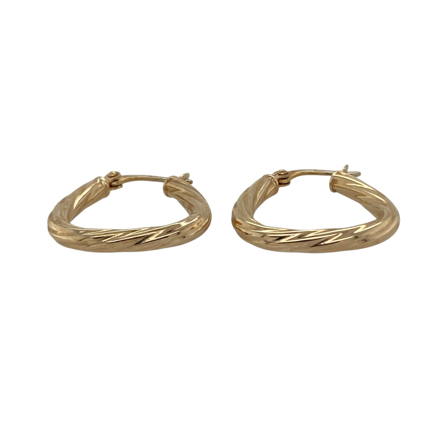 Bring unique shape and elegant texture to your collection with these pre-owned 9ct yellow gold twisted triangle creole earrings—an eye-catching pair with modern charm.

Design: Featuring a distinctive triangle-shaped creole hoop with a twisted pattern, these earrings offer a stylish blend of geometric form and refined texture.
Material: Made in 9-carat yellow gold, the polished finish enhances the twisted detailing with a warm, radiant shine.