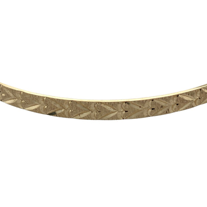 Bring romantic charm and timeless shine to your collection with this pre-owned 9ct yellow solid gold heart-patterned bangle—an elegant piece with classic appeal.

Design: Featuring a 4mm-wide band adorned with a delicate heart pattern, the bangle offers a sweet and refined decorative finish.
Material: Made in solid 9-carat yellow gold, the polished surface enhances the patterned detailing with a warm, radiant glow.