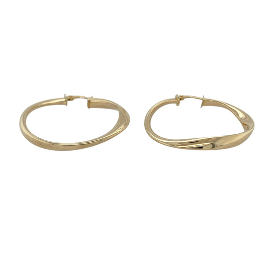 Bring elegant texture and classic shine to your collection with these pre-owned 9ct yellow gold twisted hoop creole earrings—an effortlessly stylish pair for any occasion.

Design: Featuring a traditional creole hoop enhanced with a refined twisted pattern, these earrings offer a graceful blend of texture and smooth curves.
Material: Made in 9-carat yellow gold, the polished finish highlights the twist detailing with a warm, radiant glow.