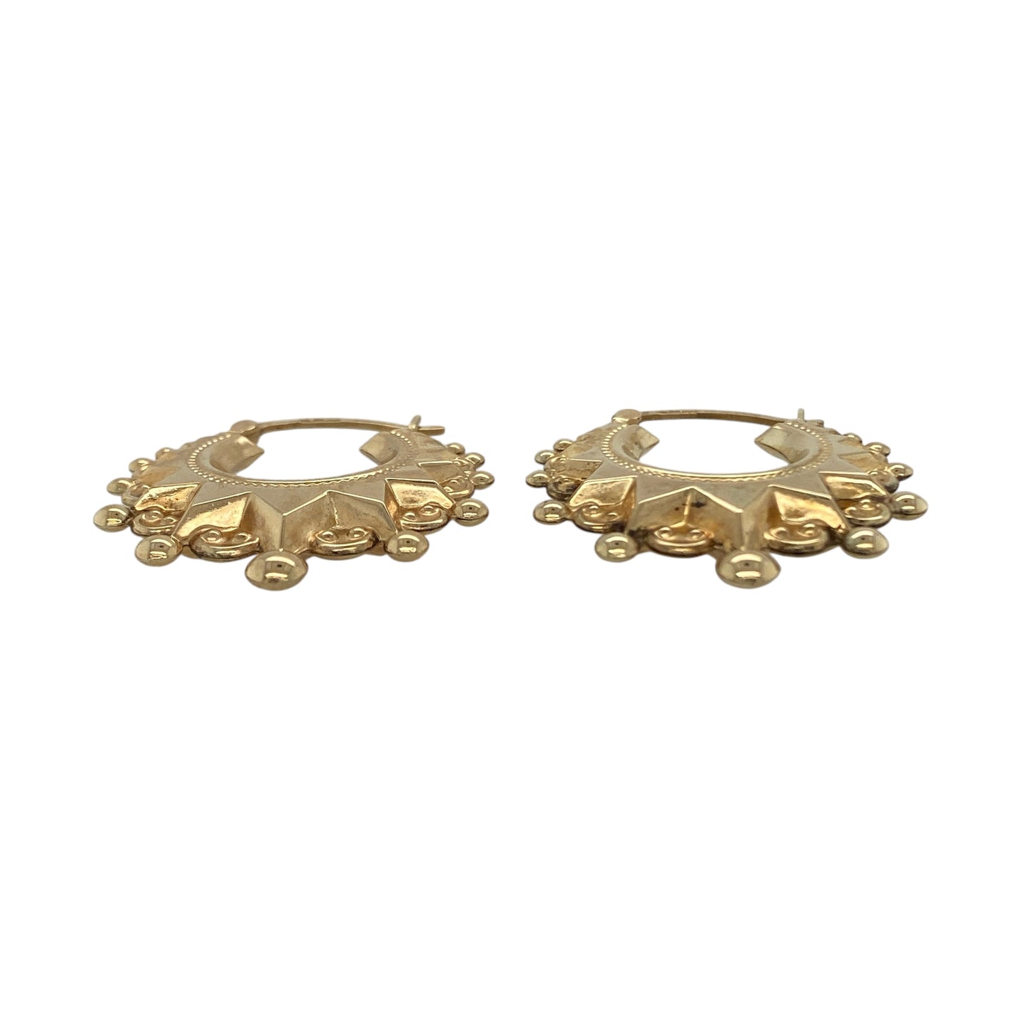 Bring bold texture and timeless shine to your collection with these pre-owned 9ct yellow gold fancy patterned hoop creole earrings—an elegant pair with classic appeal.

Design: Featuring a traditional creole hoop enhanced with an intricate fancy patterned finish, these earrings offer a richly detailed look that adds depth and sophistication.
Material: Made in 9-carat yellow gold, the polished surface highlights the ornate patterning with a warm, radiant glow.