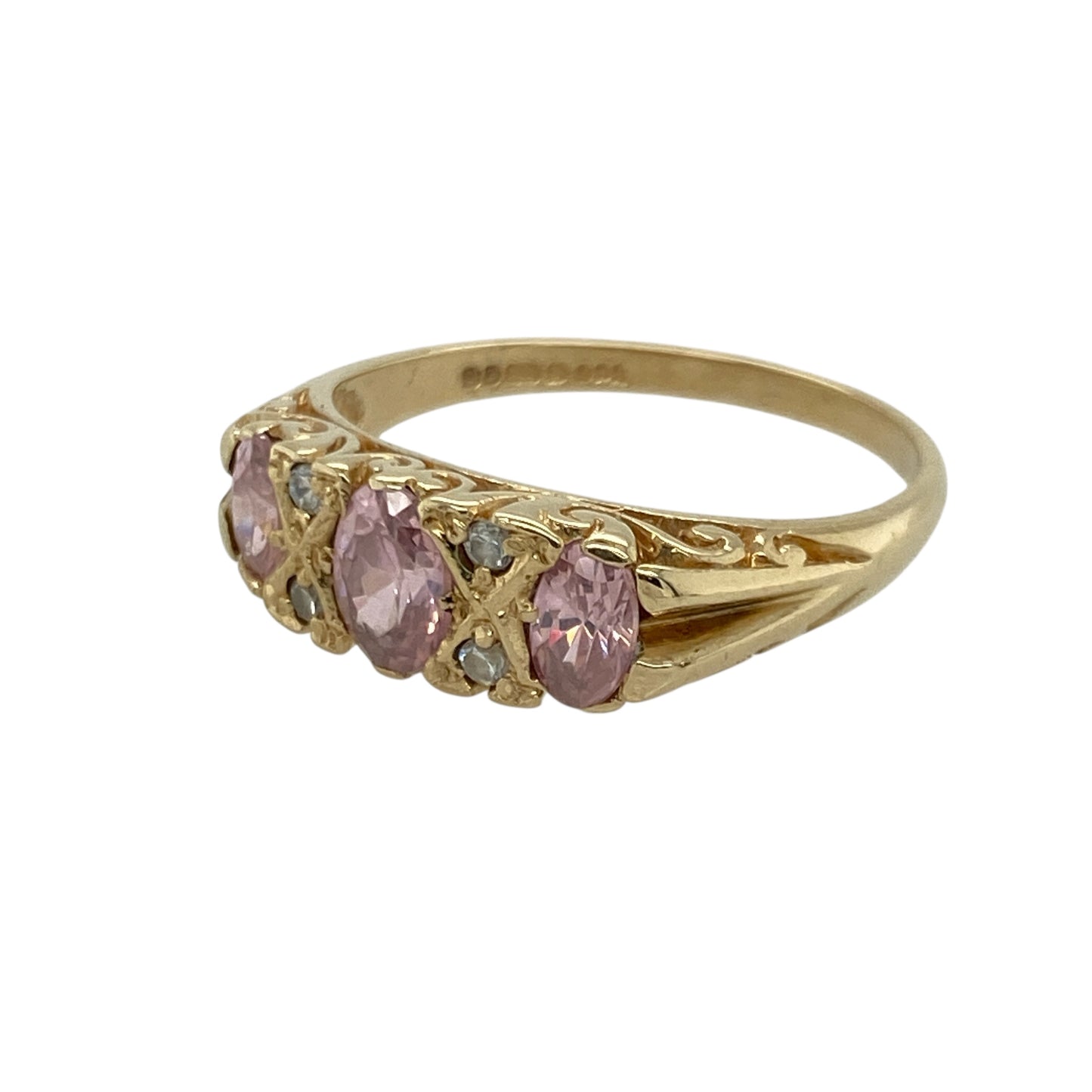 Bring soft colour and graceful sparkle to your collection with this pre-owned 9ct yellow gold pink stone and cubic zirconia ring—an elegant piece offering feminine charm and timeless appeal.

Design: This size P ring features a 6mm by 4mm oval pink centre stone, complemented by shimmering cubic zirconia accents that create a bright, balanced look across the front.