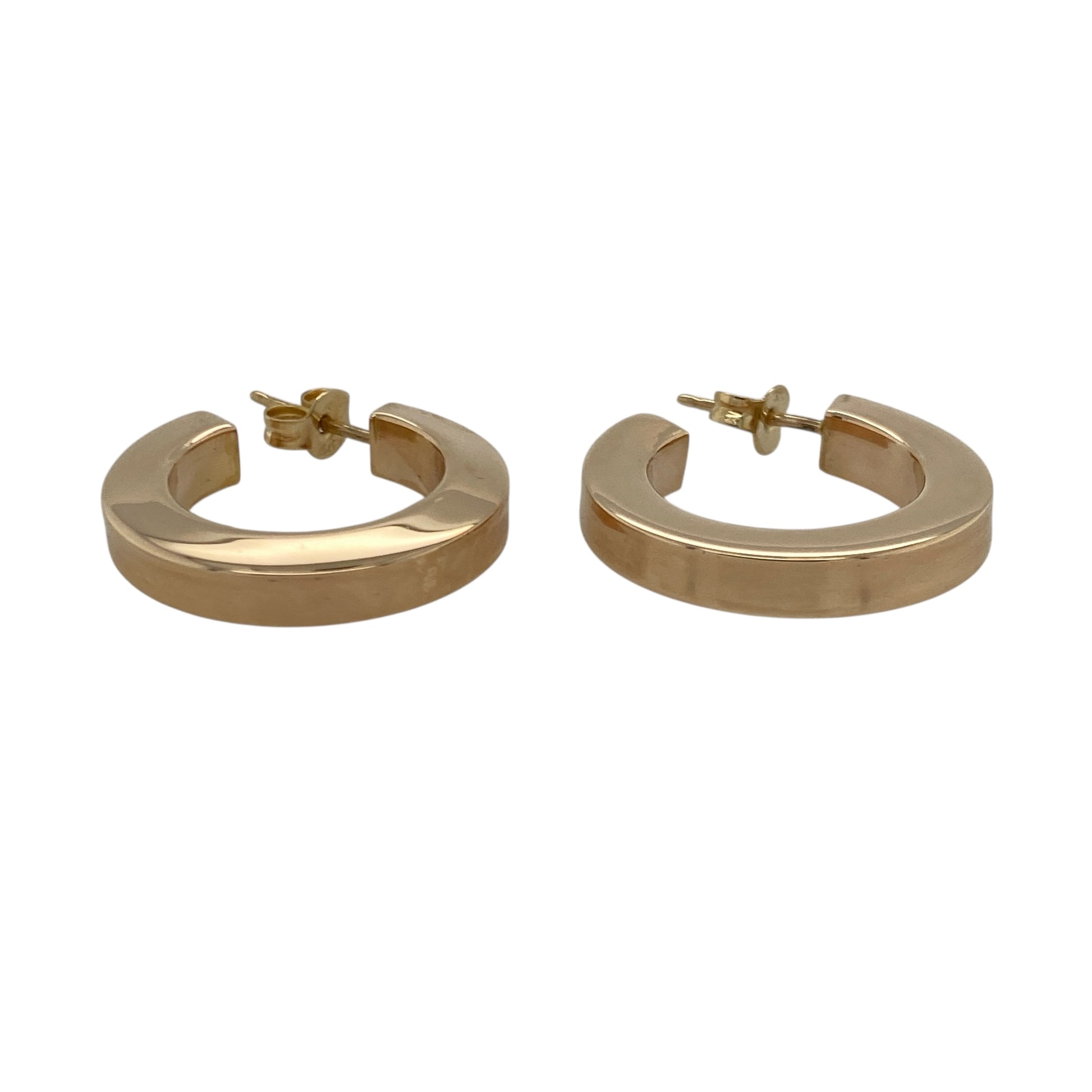 Bring classic elegance and warm golden tone to your collection with these pre-owned 9ct yellow gold half hoop stud earrings—an effortlessly stylish pair offering timeless simplicity and everyday sophistication.

Design: These earrings feature a smooth plain half-hoop shape, creating a clean, refined look that suits both casual and formal wear.
Material: Made from 9-carat yellow gold, the polished finish enhances their radiant, warm glow.