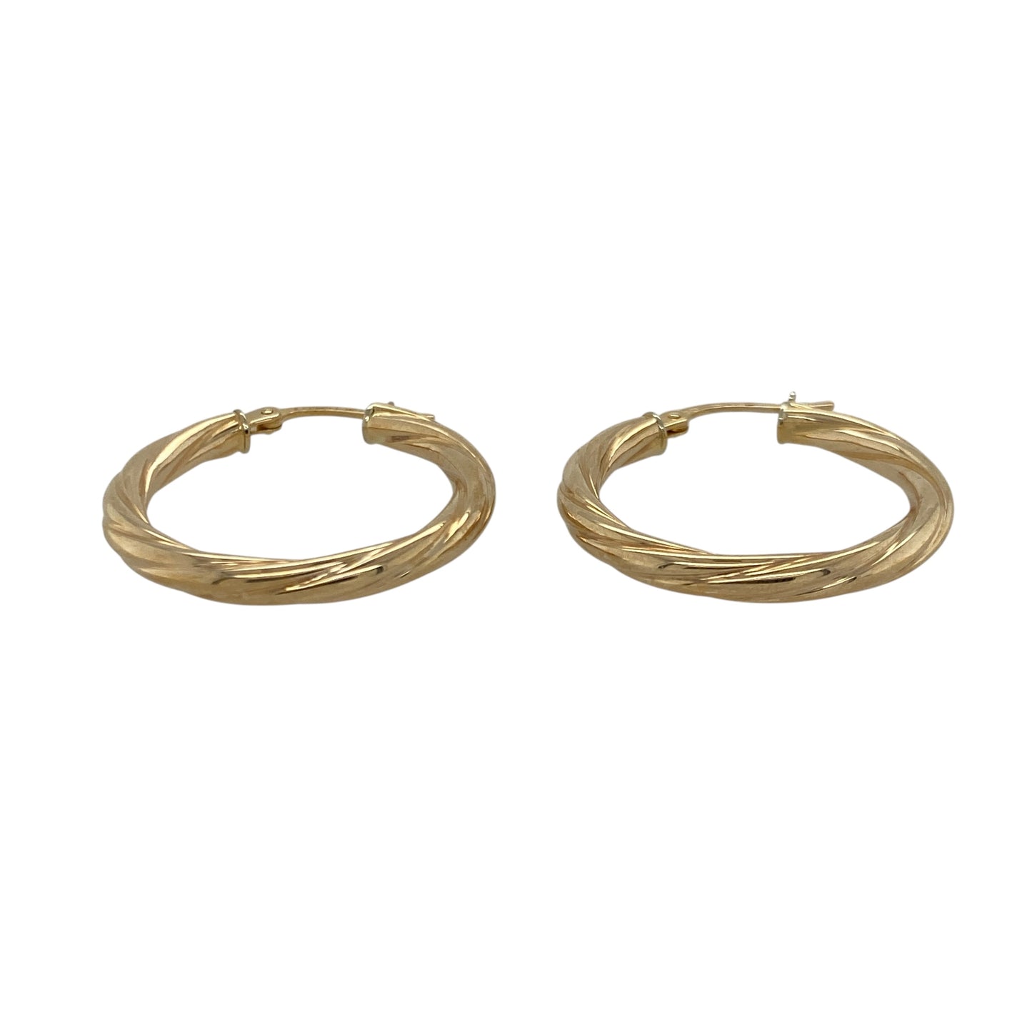 Bring elegant movement and warm golden tone to your collection with these pre-owned 9ct yellow gold twisted creole earrings—an attractive pair offering timeless style and subtle texture.

Design: These hoop creole earrings feature a twisted shape that adds depth, gentle light play, and refined visual interest to their classic form.
Material: Made from 9-carat yellow gold, the earrings display a polished, radiant finish that enhances the twist detailing.