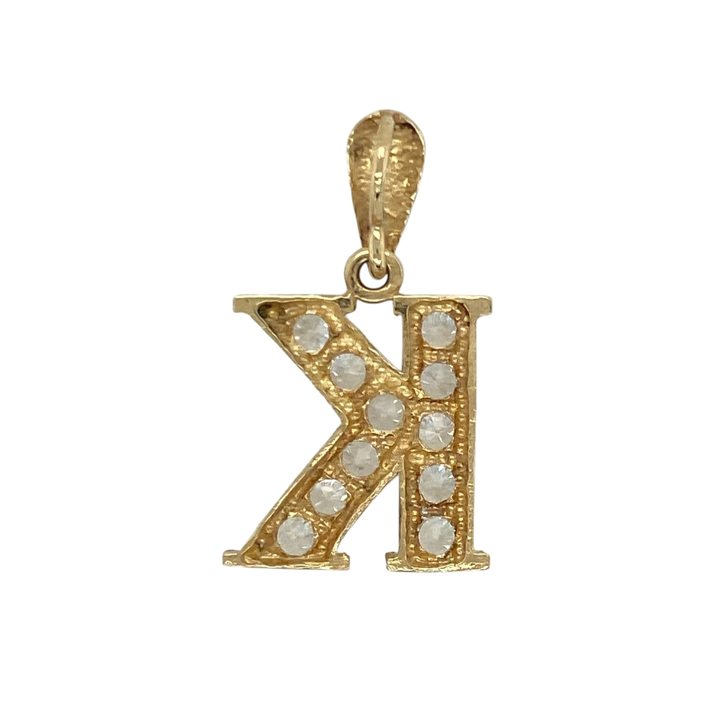 Bring personalised sparkle and elegant contrast to your collection with this pre-owned 9ct yellow and white gold initial ‘K’ pendant—an eye-catching piece offering timeless charm and meaningful style.

Design: This pendant features a bold initial ‘K’ highlighted with shimmering cubic zirconia, enhanced by the contrasting tones of yellow and white gold for a refined, standout look.
Material: Made from 9-carat yellow and white gold, the polished finish enhances both the bright stones and the two-tone design.