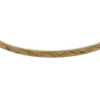 Bring elegant texture and warm golden tone to your collection with this pre-owned 9ct yellow solid gold patterned bangle—an attractive piece offering timeless style and refined detail.

Design: This bangle features a delicate 3mm patterned finish, adding subtle depth and visual interest to its classic circular form.
Material: Made from solid 9-carat yellow gold, the polished surface enhances its radiant, enduring shine.