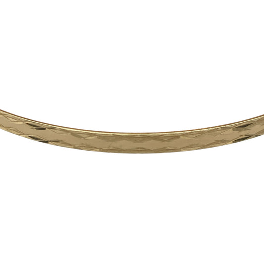 Bring elegant texture and warm golden tone to your collection with this pre-owned 9ct yellow solid gold patterned bangle—an attractive piece offering timeless style and refined detail.

Design: This bangle features a 4mm patterned finish, adding subtle depth and eye-catching detail to its classic circular shape.
Material: Made from solid 9-carat yellow gold, the polished surface enhances its radiant, enduring shine.