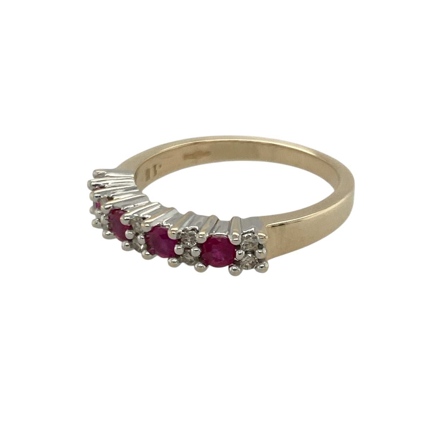 Bring rich colour and refined sparkle to your collection with this pre-owned 9ct yellow gold diamond and ruby band ring—an elegant piece offering timeless beauty and classic charm.

Design: This size N band features vibrant 3mm round rubies arranged across the front, each separated by two small diamonds for a balanced and eye-catching display of colour and brilliance.
Material: Made from 9-carat yellow gold, the warm tone enhances the deep red of the rubies and the bright sparkle of the diamonds.