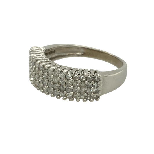 Bring bold sparkle and modern elegance to your collection with this pre-owned 9ct white gold four-row diamond band ring—an impressive piece offering radiant brilliance and contemporary style.

Design: This size P band features a 6mm wide front adorned with four rows of sparkling diamonds, creating a luxurious, light-catching display with approximately 0.75ct of total diamond content.
Material: Made from 9-carat white gold, the cool-toned polished finish enhances the diamonds’ bright, icy sparkle.