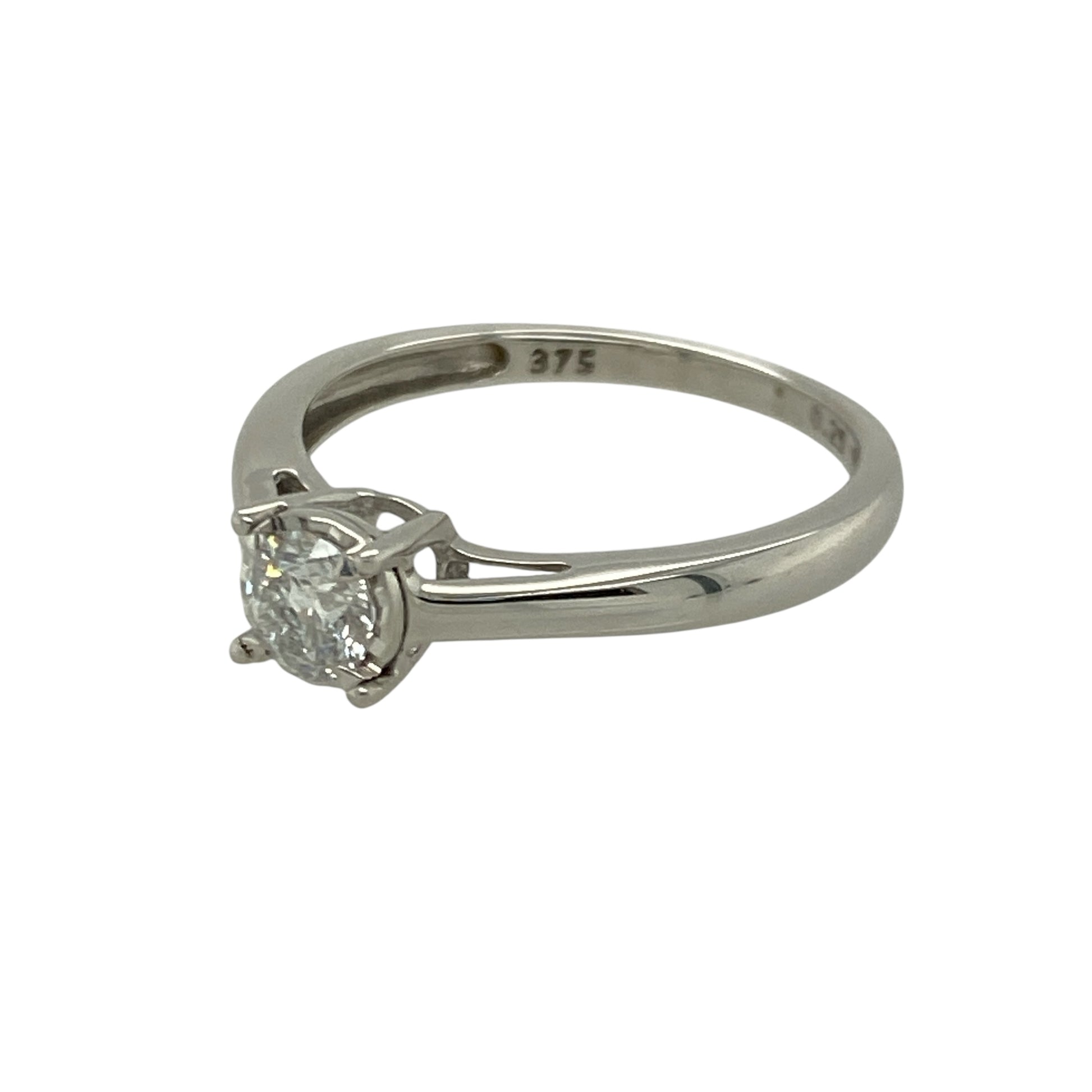 Bring classic sparkle and elegant simplicity to your collection with this pre-owned 9ct white gold diamond solitaire ring—an attractive piece offering timeless style and refined brilliance.

Design: This size M ring features an illusion-set brilliant-cut diamond of approximately 0.25ct, designed to maximise light and create a larger, more radiant appearance.
Material: Made from 9-carat white gold, the polished finish enhances the diamond’s bright sparkle while providing a clean, modern look.